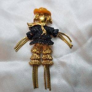 Gold tone Segmented Scare Crow Brooch